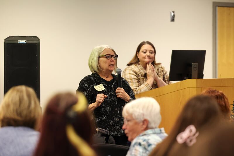 Connie Lemon, a member of the Homeless Task Force of Kankakee County, speaks to attendees alongside Dawn Broers, executive director of Fortitude Community Outreach, during the third annual Kankakee County Summit on Homelessness on Thursday, Nov. 6, 2025, hosted by the Kankakee County Homeless Task Force at Kankakee Community College.