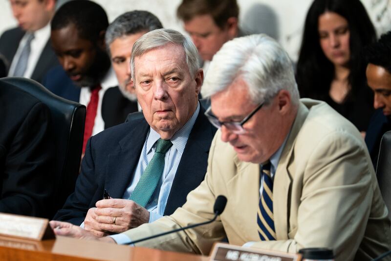 Senate Judiciary Committee Ranking Member Dick Durbin, D-Ill., listens to Sen. Sheldon Whitehouse, D-R.I., speak at an oversight hearing before the Senate Judiciary Committee, on Capitol Hill in Washington, Tuesday, Oct. 7, 2025. (AP Photo/Allison Robbert)
