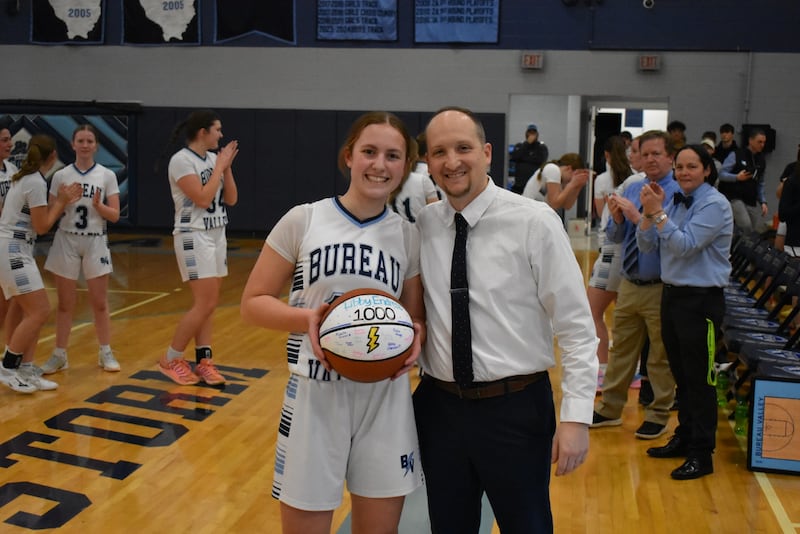 Bureau Valley junior Libby Endress became the sixth 1,000-point scorer in program history, scoring 14 points in Wednesday's 53-23 win over ROWVA-Wiliamsfield at the Storm Cellar. BV coach Jon Henegar presented her with a commemorative basketball.