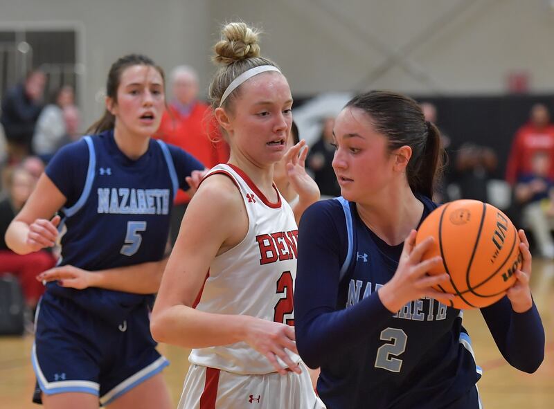 Nazareth’s Samantha Austin (2) looks to pass as Benet’s Bridget Rifenburg defends during a game on January 28, 2026 at Benet Academy in Lisle.