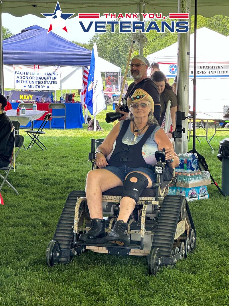 Phyllis Clower uses a VetTank at the POW WOW AllenForce event at Cantigny Park in 2024.