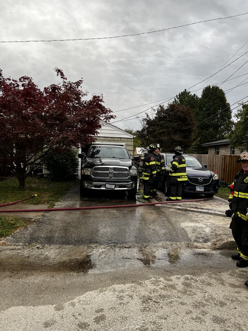 Joliet fire fighters work to put out a fire in the 1200 block of Schriber on Saturday, Oct. 25, 2025.