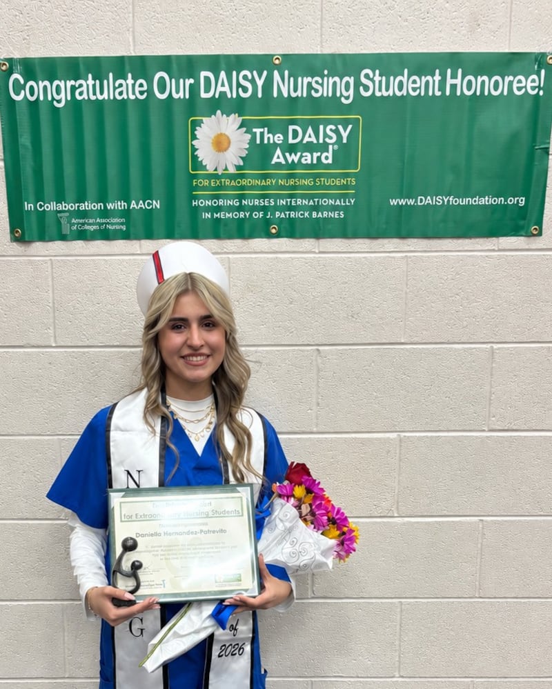 Daniela Hernandez-Patrevito holds her DAISY Award® and sculpture on May 15, 2026.