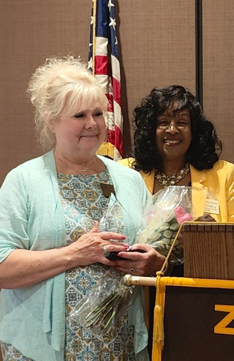 The Zonta Club of the Joliet Area, has named Terry Taylor (left), owner of Persona Grata in Shorewood, as its Woman of the Year. Taylor is pictured with Club President Bonnie Winfrey.