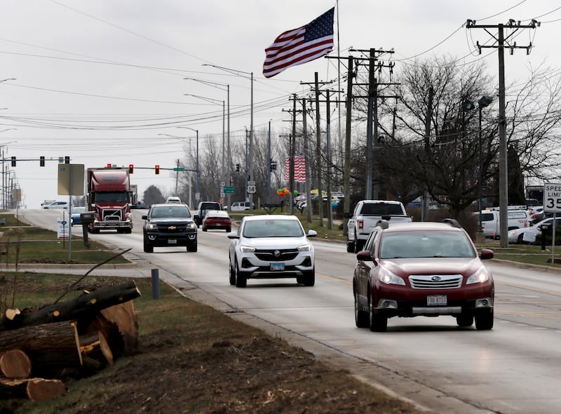 Logs are piled alongside Route 47 on Wednesday, Dec. 11, 2024, in Woodstock as tree removal continues in preparation for the Route 47 construction project.