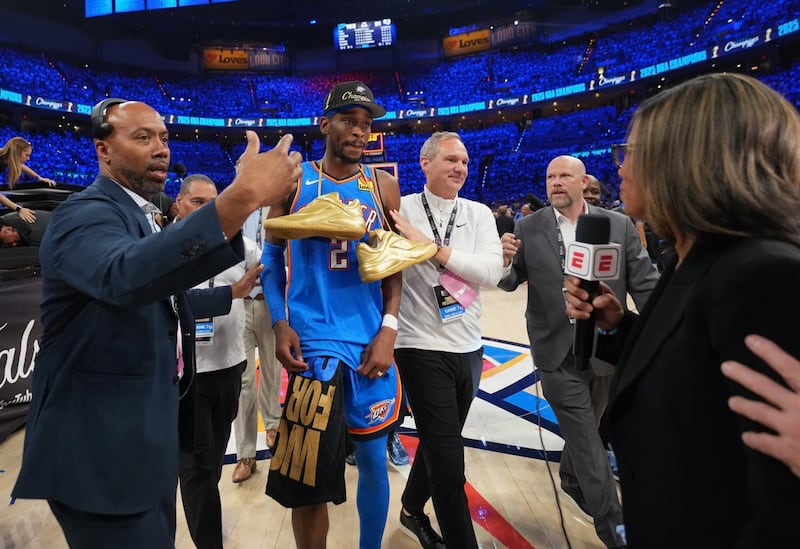 Matt Tumbleson directs Thunder star ‘Shai Gilgeous-Alexander to an interview with ESPN following the Thunder's NBA Championship over the Indianapolis Pacers on June 22. The 2000 Bureau Valley graduate has worked 21 years in the NBA, the past 14 for the Thunder, now serving as the team’s Vice President of Basketball Communications & Engagement.