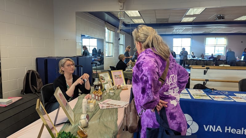 Krissi Carroll, registered nurse and healing touch therapist, talks to attendees at State Sen. Meg Loughran Cappel’s Women’s Health Care Expo on Saturday, March 21, 2026, at the C.W. Avery Family YMCA in Plainfield.