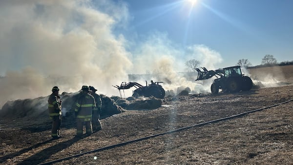 Photos: Firefighters battle hay bale fire at Ogle County farm