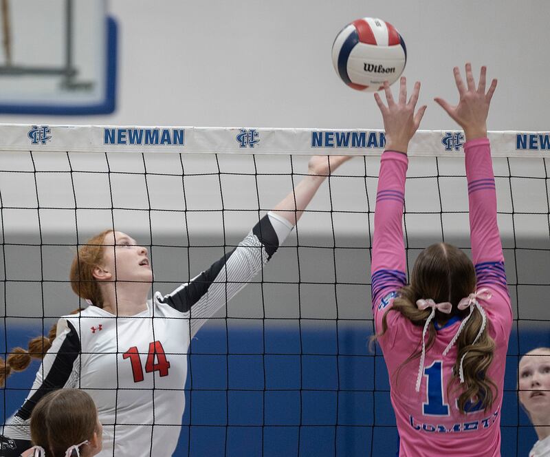Erie-Prophetstown’s Eden Jensen plays a shot against Newman’s Kennedi Shippert Tuesday, Oct. 14, 2025.