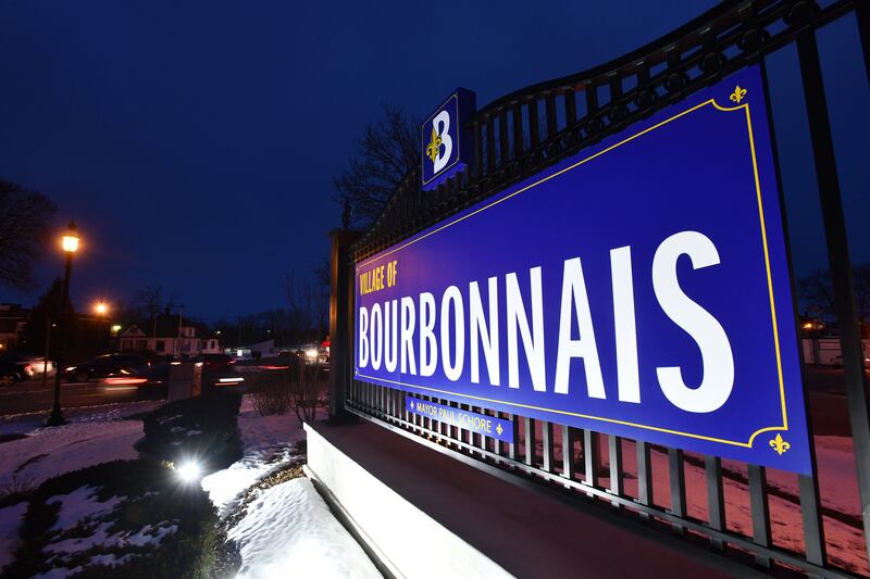 Traffic passes the Village of Bourbonnais' welcome sign on Route 45 and Main Street NW.
