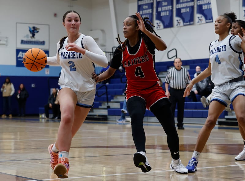 Nazareth's Samantha Austin (2) handles the ball during the girls varsity basketball game between Bolingbrook high school and Nazareth Academy on Monday, Jan. 12, 2026 in La Grange Park.