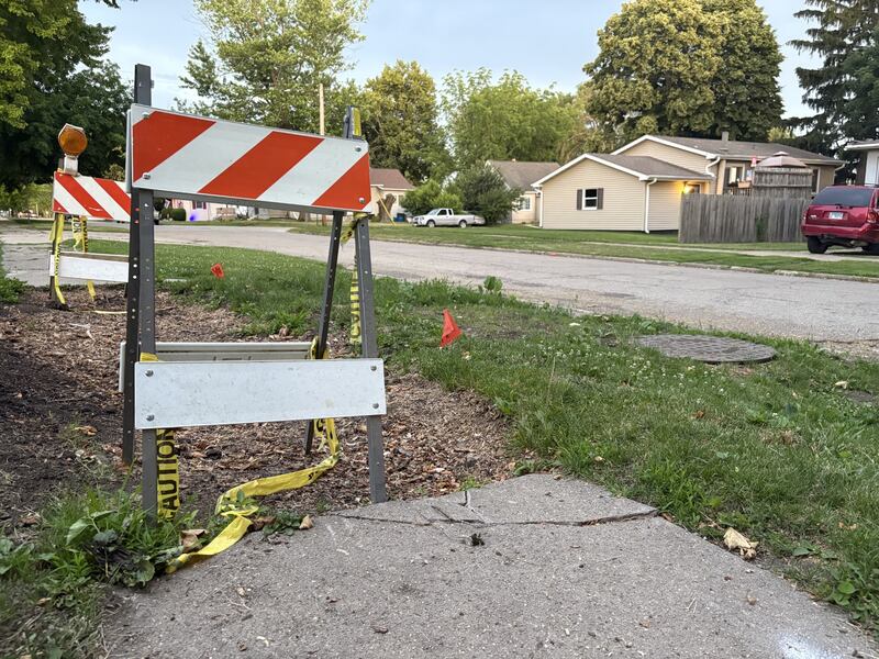 A section of sidewalk on Devlin Street in Spring Valley is marked for replacement as part of the city’s 2025 sidewalk improvement program.