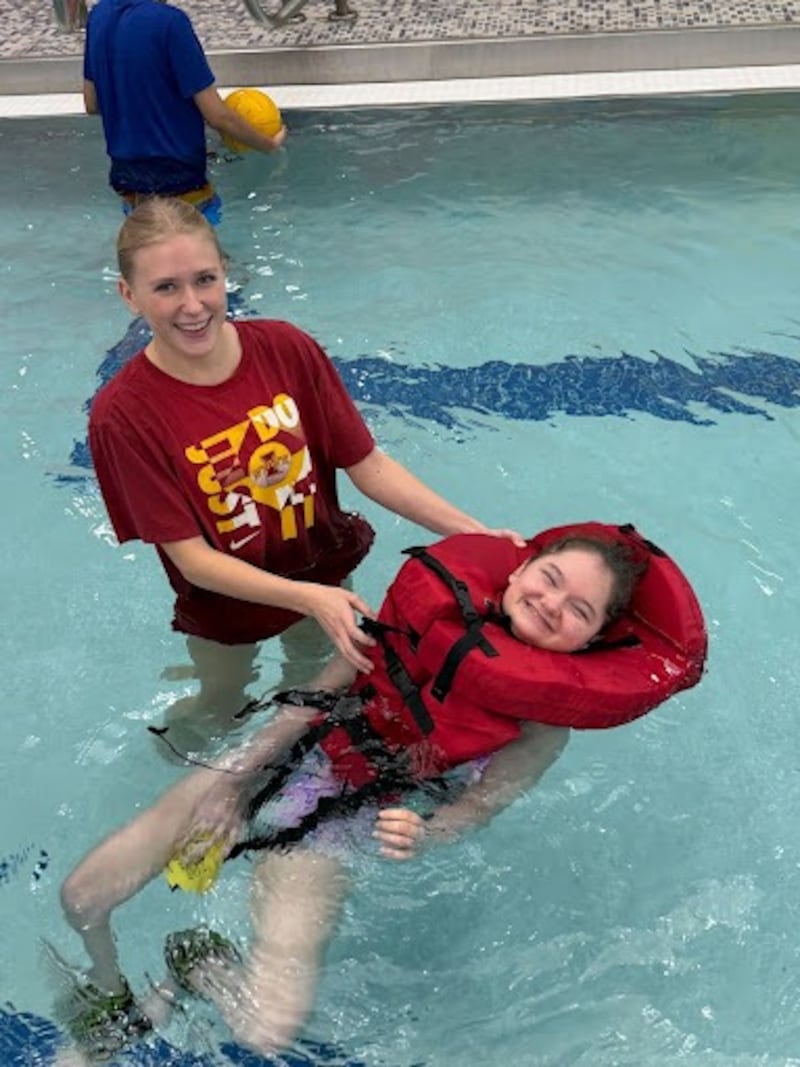 Oswego East High School students participate in the Collaborative PE Program's swim unit, supported by life vests donated by the school's Parent Teacher Organization.