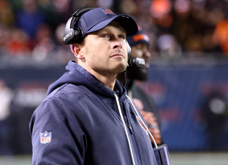 Chicago Bears head coach Ben Johnson looks at a replay on the big screen Saturday, December 20, 2025, during their game against the Packers at Soldier Field in Chicago. Love was injured on the play.