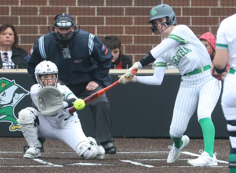 Seneca's Lexie Buis makes contact with the ball against Geneseo on Thursday, March 12, 2026, at Seneca High School.