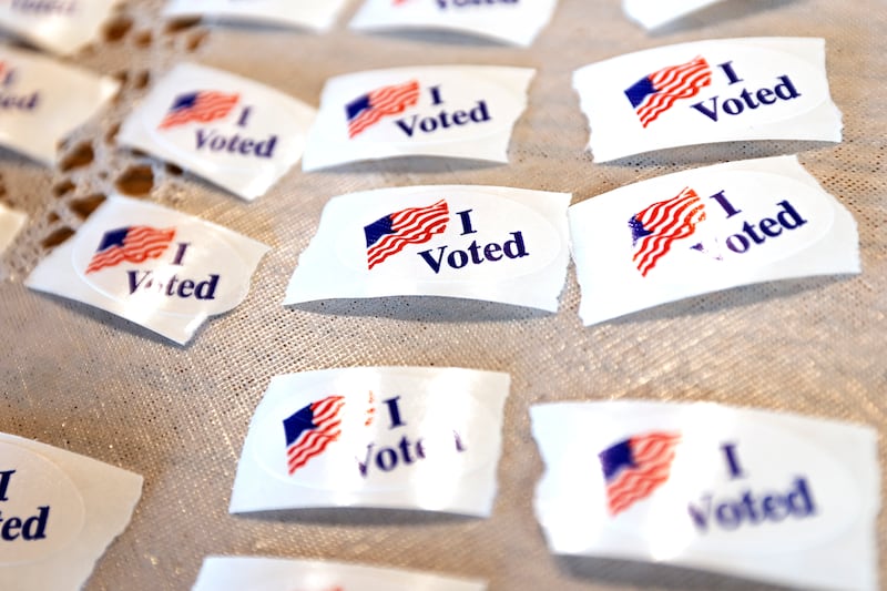 "I Voted" stickers sit on a table at the Holloway Center in Dixon on Tuesday, April 1, 2025.