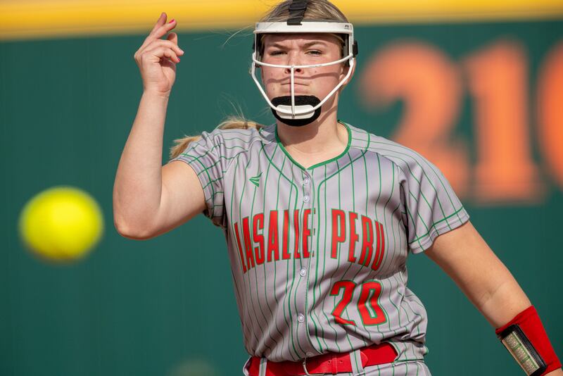 LaSalle Peru High School's Taylor Vescogni hurls a strike against a Kaneland High School batter during the game on April 28, 2025 at the LaSalle Peru High School Sports Complex.
