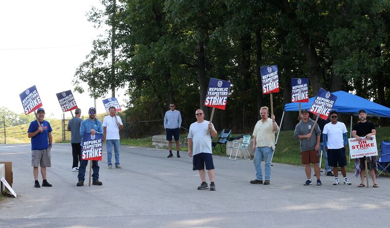 Workers with Republic Services and Teamsters Local 179 picket in front of the south entrance to Republic Services on Wednesday, July 2, 2025 in Ottawa. The strike involves 25 employees at Republic Services at the Otawa facility.
The action will disrupt waste collections for tens of thousands of residents throughout LaSalle County. Republic Teamsters are demanding a contract with improved wages, better benefits, and stronger labor protections. The Illinois strike comes after 450 Republic Teamsters in Boston went on strike on Tuesday. Hundreds of additional Teamsters across the country are having similar contract disputes with Republic.