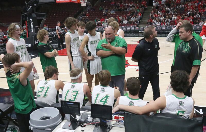 Seneca head boys basketball coach Russ Witte talks to his team during a timeout while playing Streator on Tuesday, Dec. 21, 2023 at the United Center in Chicago.