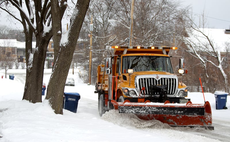 A St. Charles snow plow clears one of the city's streets after several inches of snow fell the morning of Monday, Jan. 24, 2022.