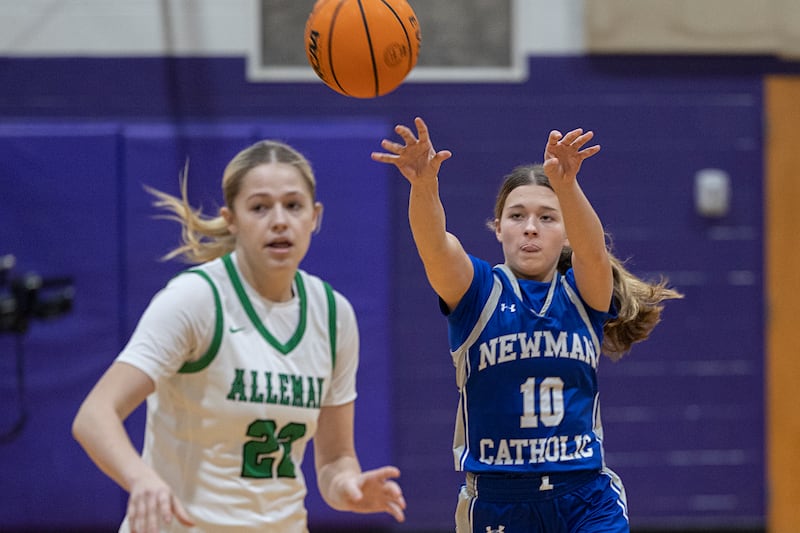Newman’s Elaina Allen makes a pass against Alleman Friday, Dec. 26, 2025, at the Duchesses Basketball Christmas Classic.