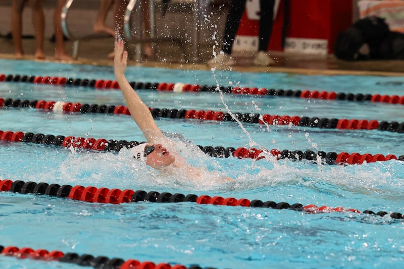Bradley-Bourbonnais' Eli Swafford leads the 100-yard backstroke race during the All-City meet on Tuesday, Jan. 6, 2026. Swafford would take first with a time of 55.96 seconds, setting a new school record in the event.