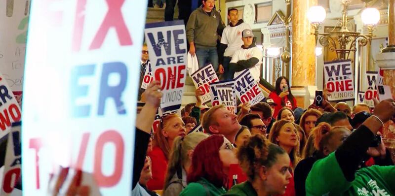 Union members in the We Are One Illinois coalition hold a rally at the Illinois Capitol in November 2024.
