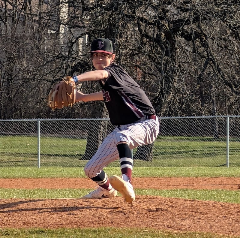 Richmond-Burton's Grayson Morningstar delivers a pitch against Woodstock on Monday, April 14, 2025, at Emricson Park in Woodstock.