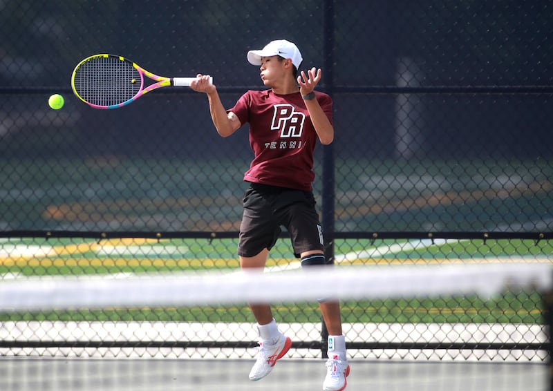 Jacob Kim of Prairie Ridge returns the ball during the first round of the 1A boys state tennis meet on Thursday, May 29. 2025 at Buffalo Grove High School.