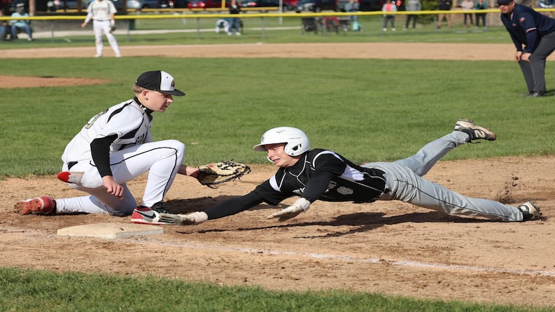 Photos: Kaneland baseball travels to Sycamore to take on the Spartans