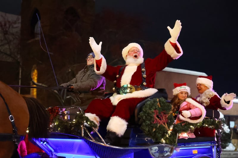 Santa Claus waves to attendees during the 40th annual Bradley Christmas Parade on Friday, Dec. 5, 2025.