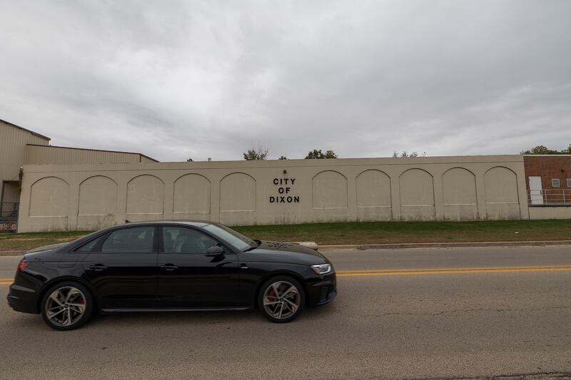 Cars pass by the Dixon Water Department Friday, Oct. 10, 2025. The city allotted money for a mural to be painted in the wall of the facility.