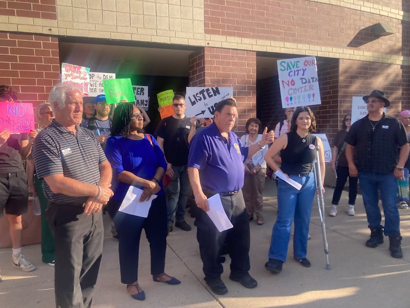 About 80 people, including some elected officials from across Will County, attended a media event and protest outside Lockport Township High School East Campus prior to the city of Lockport holding a workshop there exploring the idea of a data center at the old Chevron property on Tuesday. May 26, 2026.