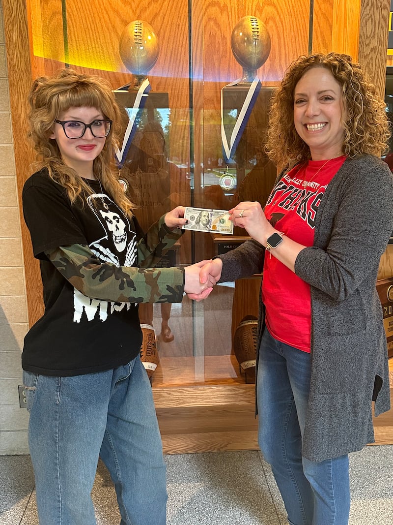 Riley Espig (left) was recently named the April Student of the Month at Polo Community High School. She received a scholarship from the Polo Schools Foundation for her efforts. Pictured at right is Foundation Member Jen Grobe.