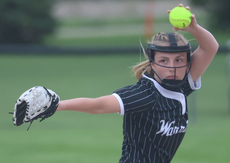 Woodland/Flanagan-Cornell's Taylor Heidenreich delivers a pitch to a Henry-Senachwine batter Tuesday, May 12, 2026, at Woodland School in rural Streator.