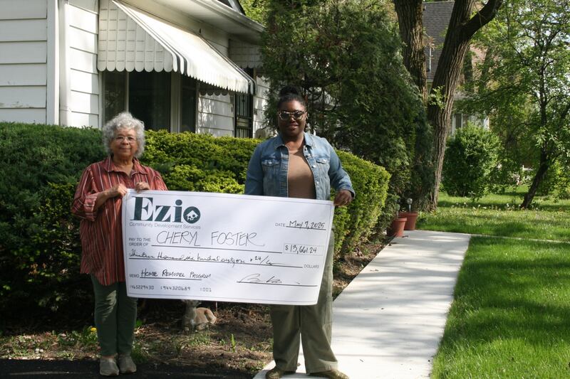 Cheryl Foster (left)  was the sole recipient of Ezio Community Development Services' first Home Remodel and Repair Grant for improvements at Foster's home at Joliet's Manningdale neighborhood. Foster is pictured with Boise Walker, who founded the Ezio Community Development Services nonprofit in 2017.