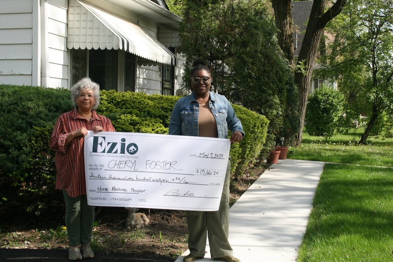 Cheryl Foster (left) was the sole recipient of Ezio Community Development Services' first Home Remodel and Repair Grant for improvements at Foster's home at Joliet's Manningdale neighborhood. Foster is pictured with Boise Walker, who founded the Ezio Community Development Services nonprofit in 2017.