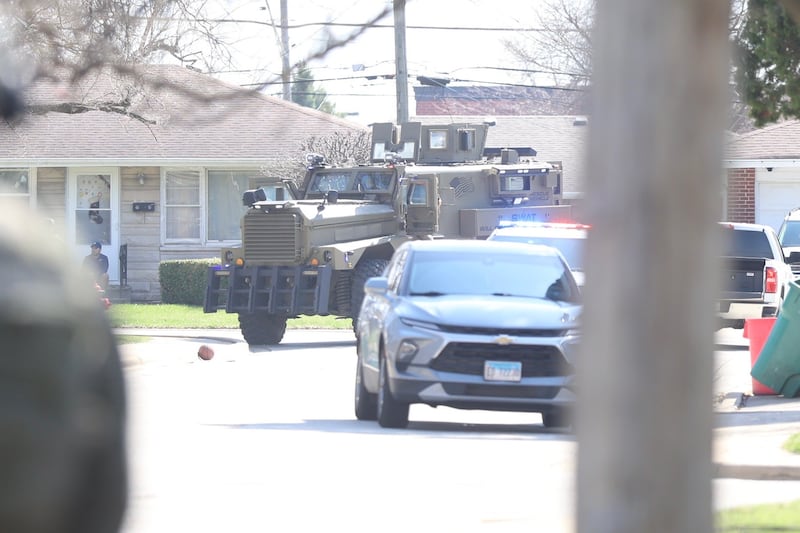 A SWAT vehicle at the scene of a barricade situation in the area of McDonnaugh Street and Hammes Avenue on Joliet's west side Monday, March 30, 2026.  Will County and Joliet police officers were at the scene.
