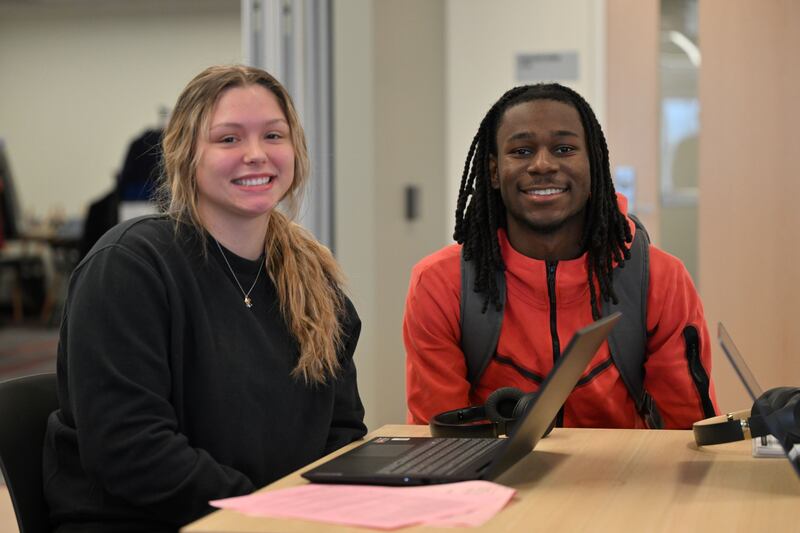 KCC students Johnetta Whitmire (left) and Khylan McKennie (right) work on classwork at the college, which will host an Explore KCC Day on July 9.
