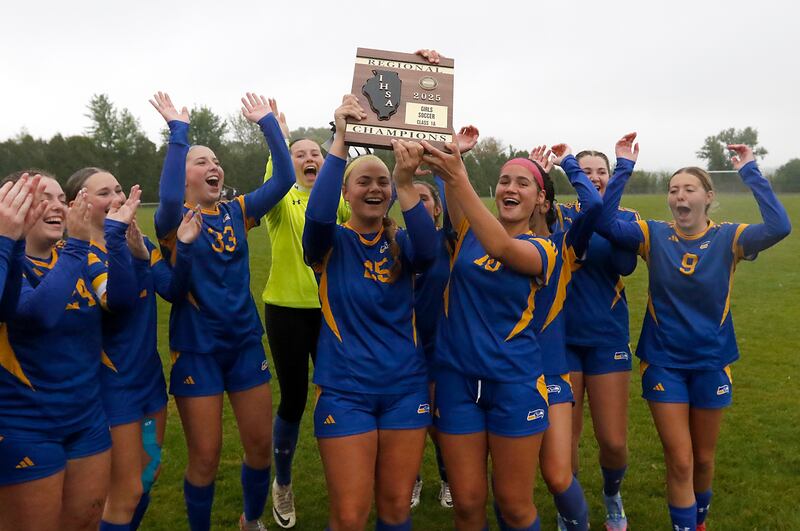 Johnsburg celebrates their win over Harvest Christian Academy in the Class 1A Marian Central Girls Soccer Regional Championship match on Tuesday, May 20, 2025, at Marian Central High School in Woodstock.