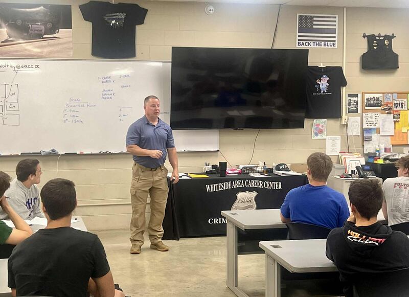 Instructor Michael Wolfley speaks to his Criminal Justice program students at the Whiteside Area Career Center in Sterling.