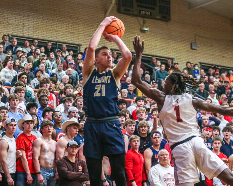 Lemont's Gabriel Sularski (21) shoots a jumper during their Class 3A Brother Rice Sectional final basketball game between Lemont at Brother Rice. March 7, 2025 in Chicago.
