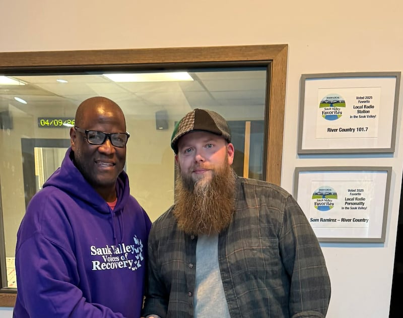 Sauk Valley Voices of Recovery Executive Director Gerald Lott (left) visits the WIXN radio station in Dixon to speak with morning show host and news director Brandon Clark (right).
