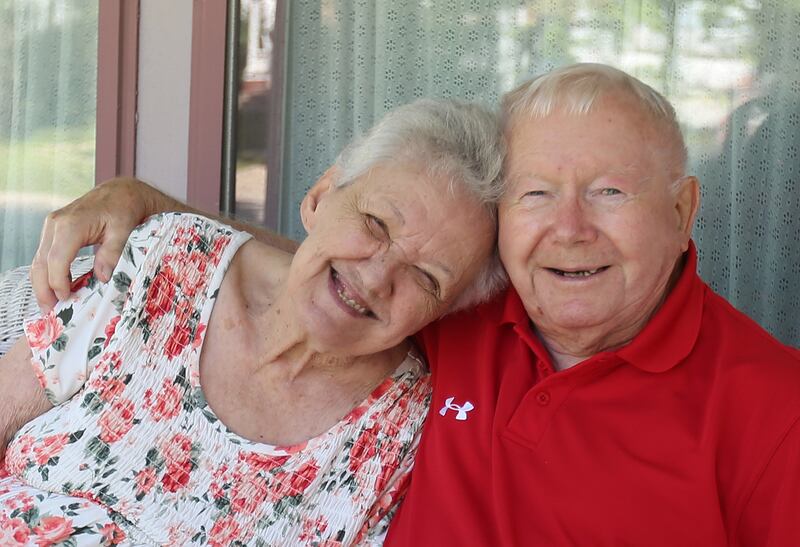 Loretta Volker and her husband Dick, pose for a photo outside their home on Wednesday, Aug. 20, 2025 in Princeton. The Volkers have been married for 65 years.