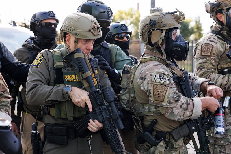 U.S. Border Patrol Commander-At-Large Gregory Bovino stands with federal immigration enforcement agents during a skirmish with protesters in Little Village neighborhood, Chicago Thursday, Oct. 23, 2025. (Anthony Vazquez/Chicago Sun-Times via AP)