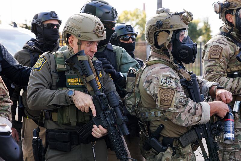 U.S. Border Patrol Commander-At-Large Gregory Bovino stands with federal immigration enforcement agents during a skirmish with protesters in Little Village neighborhood, Chicago Thursday, Oct. 23, 2025. (Anthony Vazquez/Chicago Sun-Times via AP)