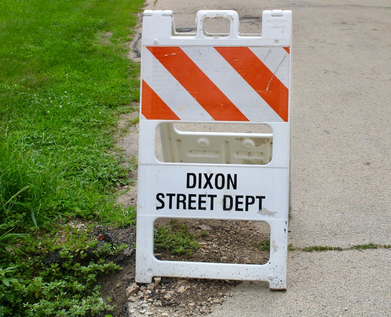 A Dixon Street Department sign.