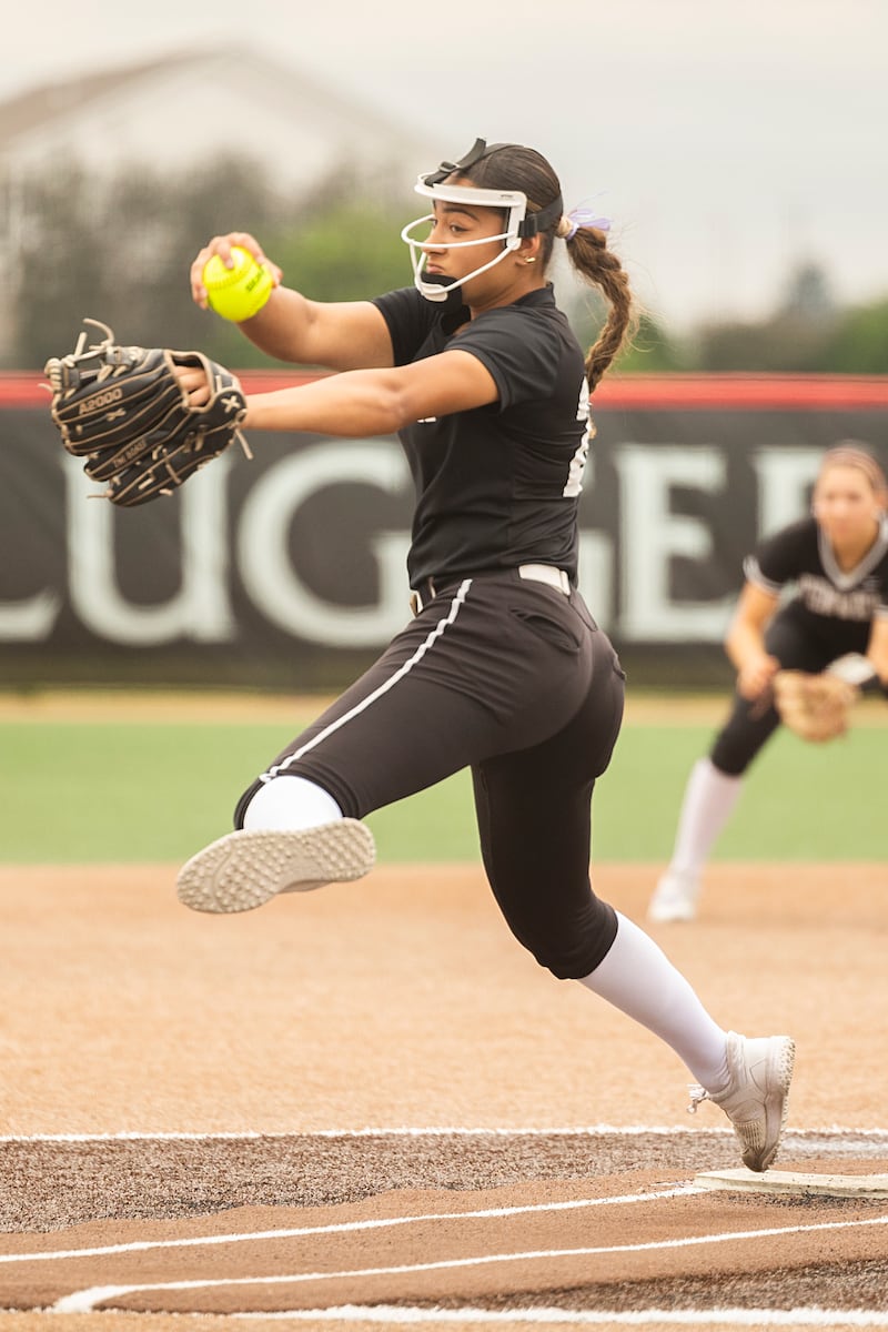 Fenwick’s Sofia Kateeb fires a pitch against Glenwood Friday, June 5, 2026, in the Class 3A softball semifinal in Peoria. Kateeb pitched the final six innings.