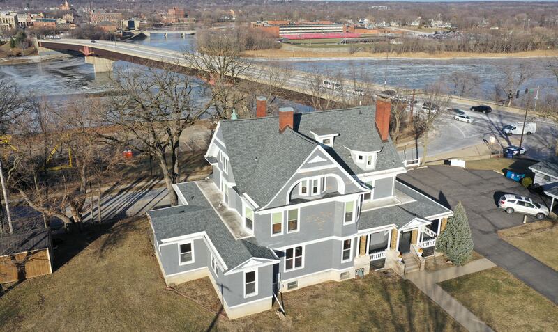 An exterior aerial view of The Cora J. Pope Home located at 116 W. Prospect Ave., in Ottawa. The home is for sale for the third time since it was built in 1902. Milton and Cora Justine Pope built this 18-room Victorian home on the south bluff of Ottawa, overlooking the Illinois River,. Cora oversaw much of the construction work herself. The couple did not have children, but each had an abiding interest in the community.

When Cora died in 1942, the sixth item in her will bequeathed her home, together with all the household furniture, furnishings, goods and equipment, “to establish and perpetually maintain a home for the comfortable support and maintenance of aged, respectable, indigent women, who may be incapable of self-support, but not including any who may be paupers, the said home to be always known and named The Cora J. Pope Home.”