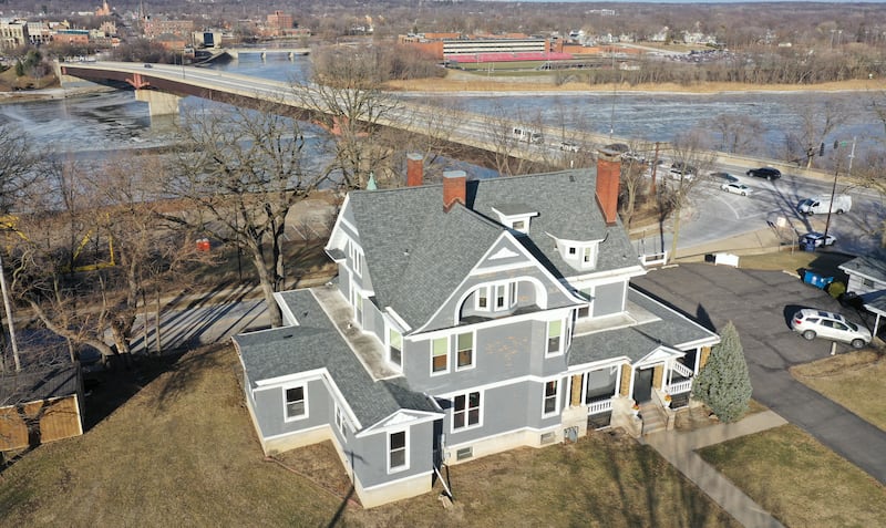 An exterior aerial view of The Cora J. Pope Home located at 116 W. Prospect Ave., in Ottawa. The home is for sale for the third time since it was built in 1902. Milton and Cora Justine Pope built this 18-room Victorian home on the south bluff of Ottawa, overlooking the Illinois River,. Cora oversaw much of the construction work herself. The couple did not have children, but each had an abiding interest in the community.

When Cora died in 1942, the sixth item in her will bequeathed her home, together with all the household furniture, furnishings, goods and equipment, “to establish and perpetually maintain a home for the comfortable support and maintenance of aged, respectable, indigent women, who may be incapable of self-support, but not including any who may be paupers, the said home to be always known and named The Cora J. Pope Home.”